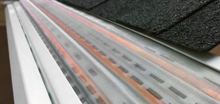 Copper-infused gutter guard mesh preventing biological growth