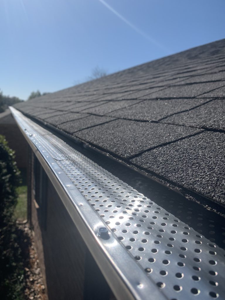 Leaf guard system installed on gutters in North Aurora, IL
