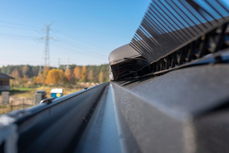 Close-up view of MasterShield micro-mesh gutter guard on a residential roof.
