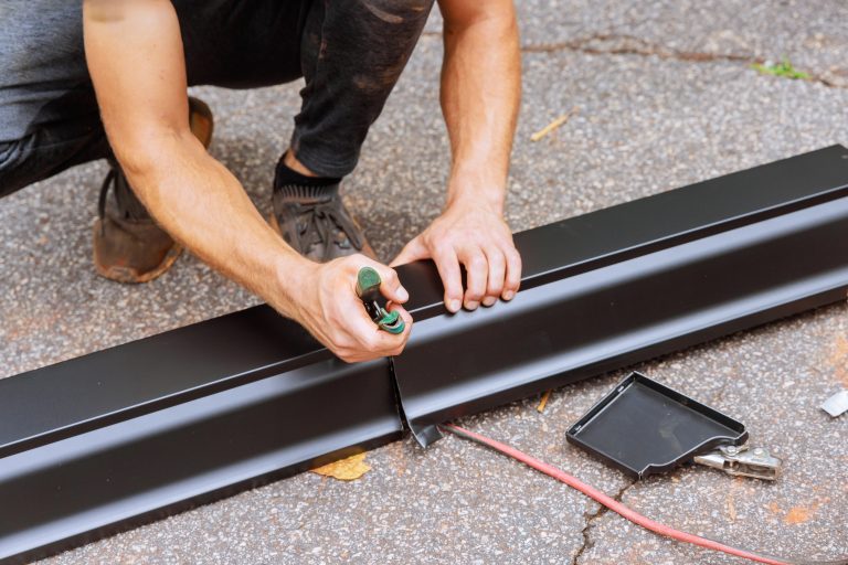 Fixing sagging gutter on two-story home in Aurora, IL