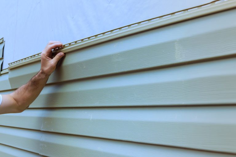 Before and after siding repair in North Aurora